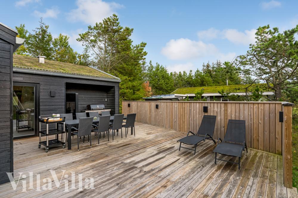 Genießen Sie einen Grillabend auf der Terrasse des Luxusferienhauses Nr. 944 in Nordjütland