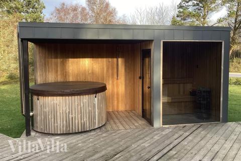 Genießen Sie den warmen Whirlpool im Luxusferienhaus Nr. 924 in Lolland/Falster/Mön