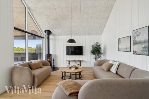 Die Couchecke im Luxusferienhaus Nr. 928 in Westjütland.