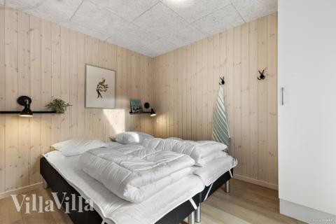 Eines der 7 Schlafzimmer im Luxusferienhaus Nr. 810