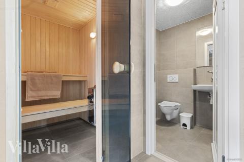 Genießen Sie die heiße Sauna im Luxusferienhaus Nr. 810 für 18 Personen