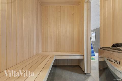 Genießen Sie die heiße Sauna im Luxusferienhaus Nr. 814 für 26 Personen