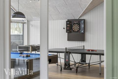 Das Luxusferienhaus 814 für 26 Personen hat einen großen Aktivitätsraum mit u. a. Billard und Darts