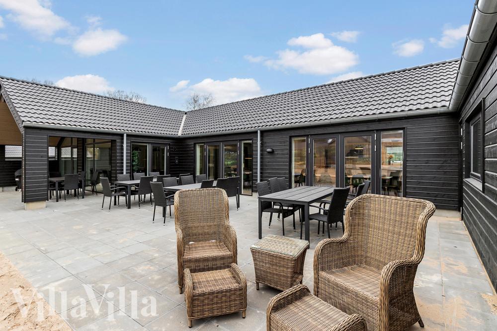 Das Luxusferienhaus Nr. 814 hat eine tolle Terrasse, die mit hochwertigen Gartenmöbeln für 26 Personen ausgestattet ist.