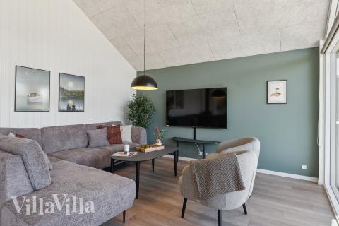 Die Couchecke im Luxusferienhaus Nr. 930 in Westjütland.