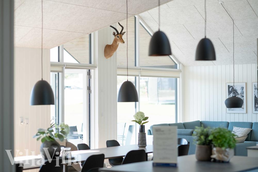Der Aufenthaltsraum bietet Platz für 18 Personen, wenn ihr das Ferienhaus 696 in Fünen und seine Inseln besucht.