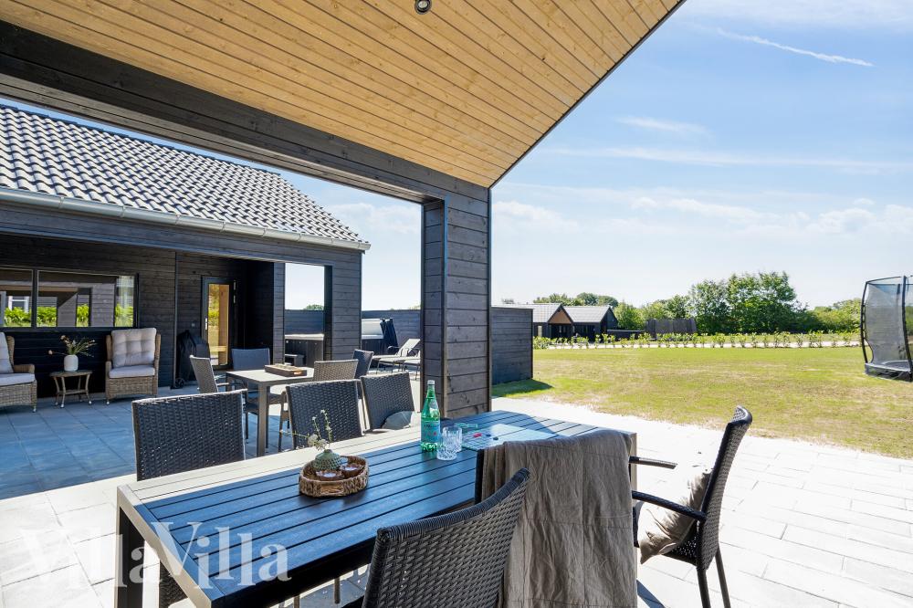 Genießen Sie einen Grillabend auf der Terrasse des Luxusferienhauses Nr. 771 in Deutschland