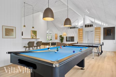 Neben den vielen schönen Stunden, die man im Poolbereich des Hauses verbringen kann, bietet das Luxusferienhaus 774 auch Spielevergnügen bei Billard/Tischtennis und Darts