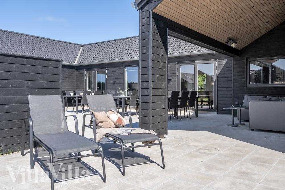 Das Luxusferienhaus Nr. 778 hat eine tolle Terrasse, die mit hochwertigen Gartenmöbeln für 20 Personen ausgestattet ist.