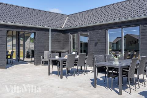 Genießen Sie einen Grillabend auf der Terrasse des Luxusferienhauses Nr. 778 in Deutschland