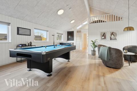 Neben den vielen schönen Stunden, die man im Poolbereich des Hauses verbringen kann, bietet das Luxusferienhaus 772 auch Spielevergnügen bei Billard/Tischtennis und Darts