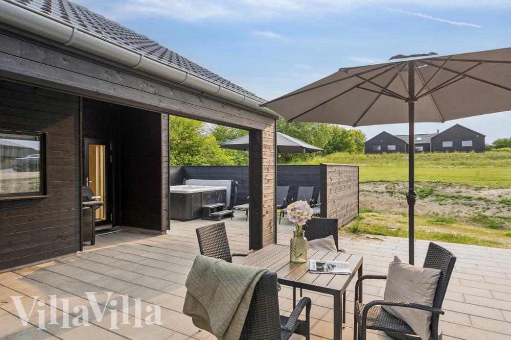 Genießen Sie einen Grillabend auf der Terrasse des Luxusferienhauses Nr. 772 in Deutschland