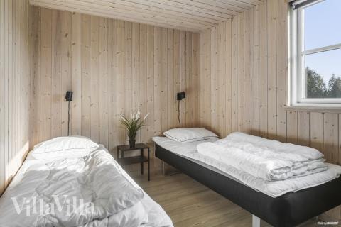 Eines der 7 Schlafzimmer im Luxusferienhaus Nr. 251