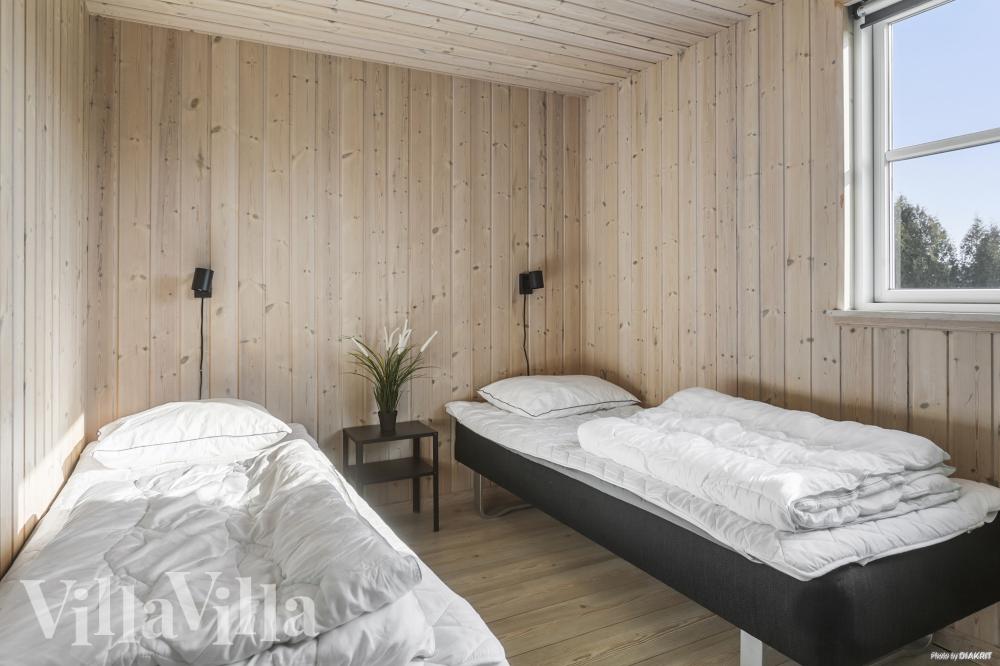 Eines der 7 Schlafzimmer im Luxusferienhaus Nr. 251