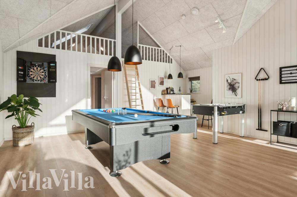 Neben den vielen schönen Stunden, die man im Poolbereich des Hauses verbringen kann, bietet das Luxusferienhaus 773 auch Spielevergnügen bei Billard/Tischtennis und Darts