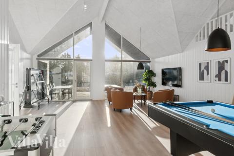 Das Luxusferienhaus 773 für 24 Personen hat einen großen Aktivitätsraum mit u. a. Billard und Darts