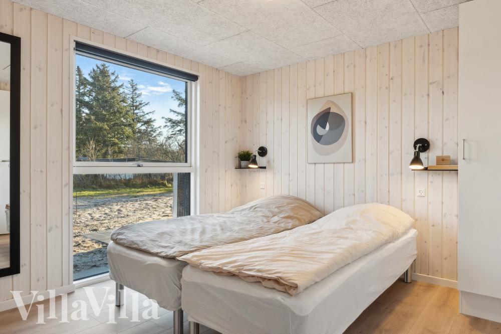 Eines der 9 Schlafzimmer im Luxusferienhaus Nr. 773