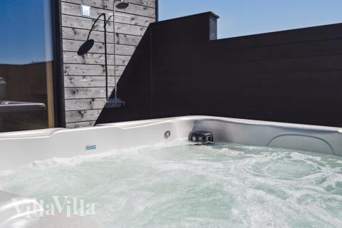 Genießen Sie den warmen Whirlpool im Luxusferienhaus Nr. 773 in Deutschland