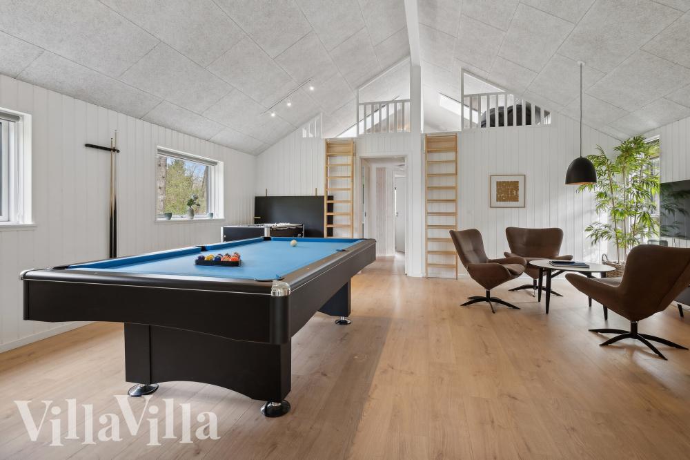 Neben den vielen schönen Stunden, die man im Poolbereich des Hauses verbringen kann, bietet das Luxusferienhaus 775 auch Spielevergnügen bei Billard/Tischtennis und Darts