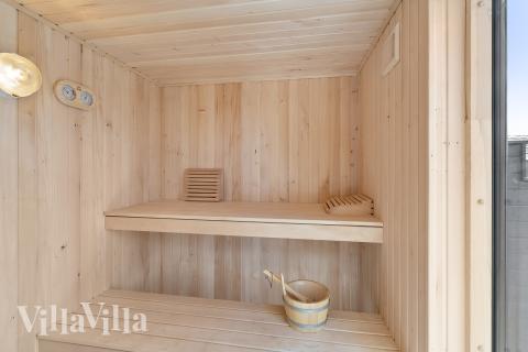 Genießen Sie die heiße Sauna im Luxusferienhaus Nr. 775 für 16 Personen