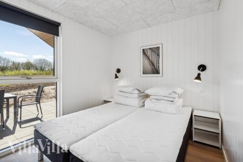 Eines der 9 Schlafzimmer im Luxusferienhaus Nr. 777