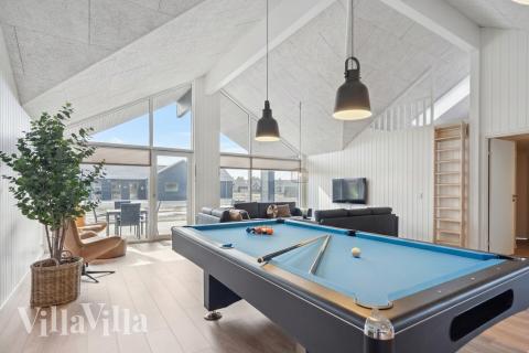 Neben den vielen schönen Stunden, die man im Poolbereich des Hauses verbringen kann, bietet das Luxusferienhaus 779 auch Spielevergnügen bei Billard/Tischtennis und Darts