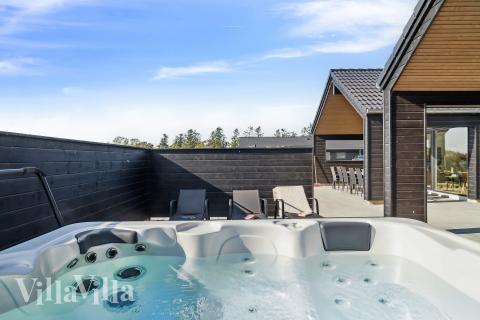 Genießen Sie den warmen Whirlpool im Luxusferienhaus Nr. 779 in Deutschland