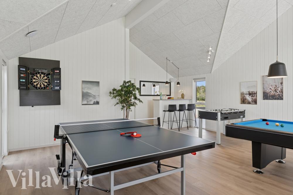 Das Luxusferienhaus 780 für 26 Personen hat einen großen Aktivitätsraum mit u. a. Billard und Darts