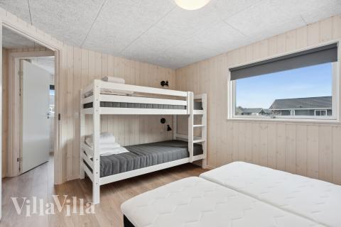 Eines der 10 Schlafzimmer im Luxusferienhaus Nr. 780