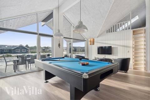 Neben den vielen schönen Stunden, die man im Poolbereich des Hauses verbringen kann, bietet das Luxusferienhaus 782 auch Spielevergnügen bei Billard/Tischtennis und Darts