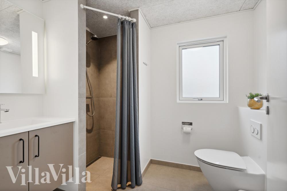 Eines der Badezimmer im Luxusferienhaus Nr. 782