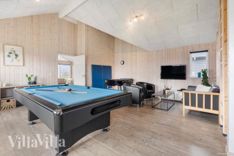 Neben den vielen schönen Stunden, die man im Poolbereich des Hauses verbringen kann, bietet das Luxusferienhaus 322 auch Spielevergnügen bei Billard/Tischtennis und Darts