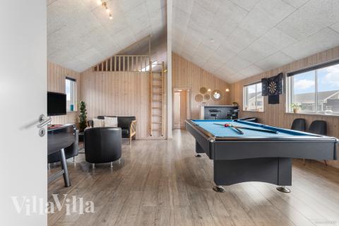 Aktivitätsraum im Luxusferienhaus Nr. 322 mit 7 Schlafzimmern und Platz für 18 Gäste.