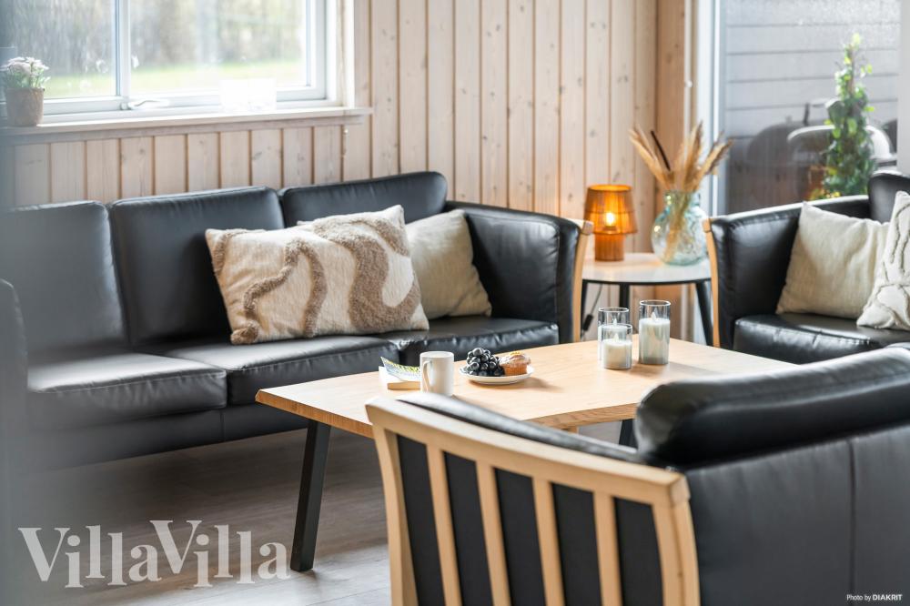 Die Couch im Luxusferienhaus Nr. 322 in Fünen und seine Inseln lädt zu Gesellschaftsspielen oder zu Kinoabenden ein.