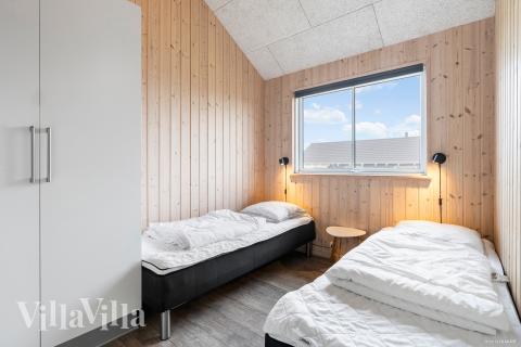 Eines der 7 Schlafzimmer im Luxusferienhaus Nr. 322