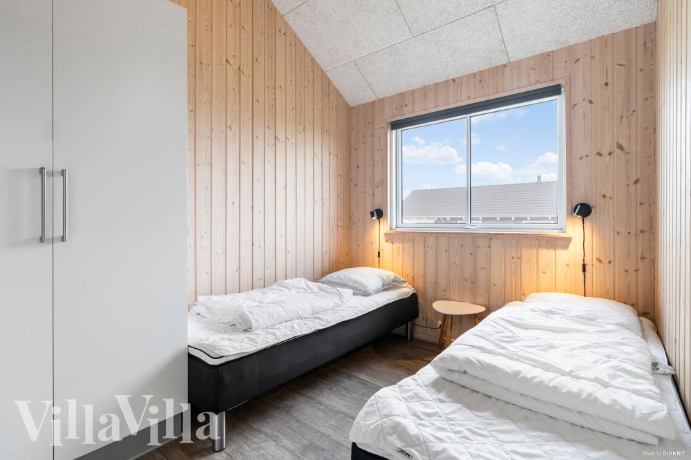 Eines der 7 Schlafzimmer im Luxusferienhaus Nr. 322
