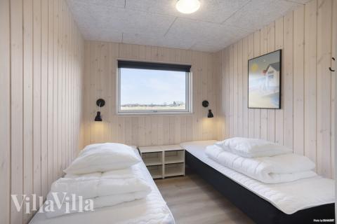 Eines der 7 Schlafzimmer im Luxusferienhaus Nr. 907