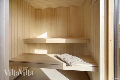 Genießen Sie die heiße Sauna im Luxusferienhaus Nr. 907 für 18 Personen