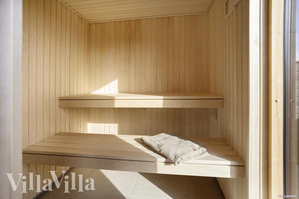 Genießen Sie die heiße Sauna im Luxusferienhaus Nr. 907 für 18 Personen