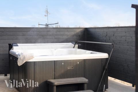 Das Luxusferienhaus Nr. 907 bietet u. a. einen tollen Whirlpool