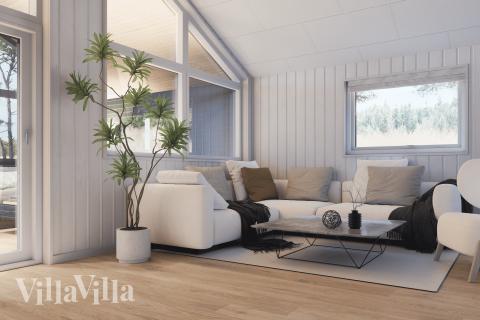 Die Couch im Luxusferienhaus Nr. 947 in Westjütland lädt zu Gesellschaftsspielen oder zu Kinoabenden ein.