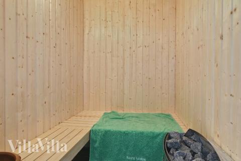 Genießen Sie die heiße Sauna im Luxusferienhaus Nr. 309 für 14 Personen
