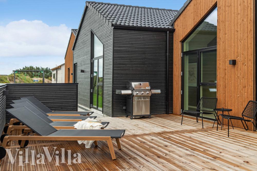 Das Luxusferienhaus Nr. 682 hat eine tolle Terrasse, die mit hochwertigen Gartenmöbeln für 18 Personen ausgestattet ist.