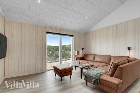 Die Couchecke im Luxusferienhaus Nr. 945 in Nordjütland.