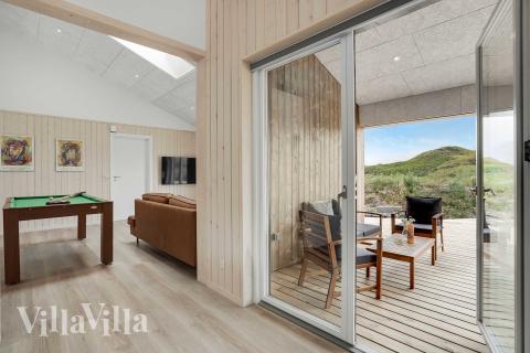 Aufenthaltsraum mit Platz für 12 im Luxusferienhaus Nr. 945.