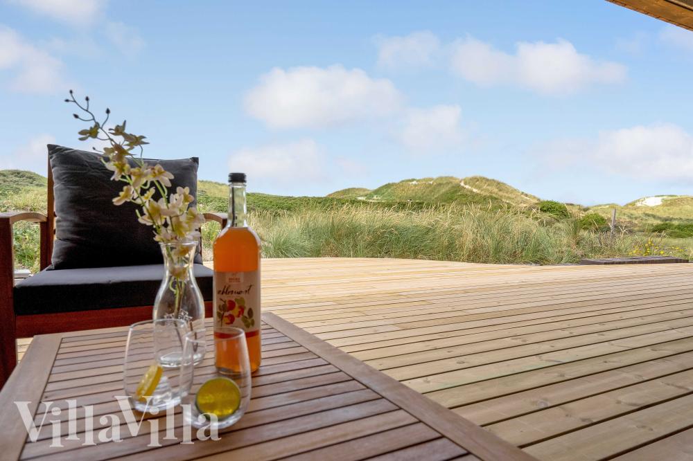 Genießen Sie einen Grillabend auf der Terrasse des Luxusferienhauses Nr. 945 in Nordjütland