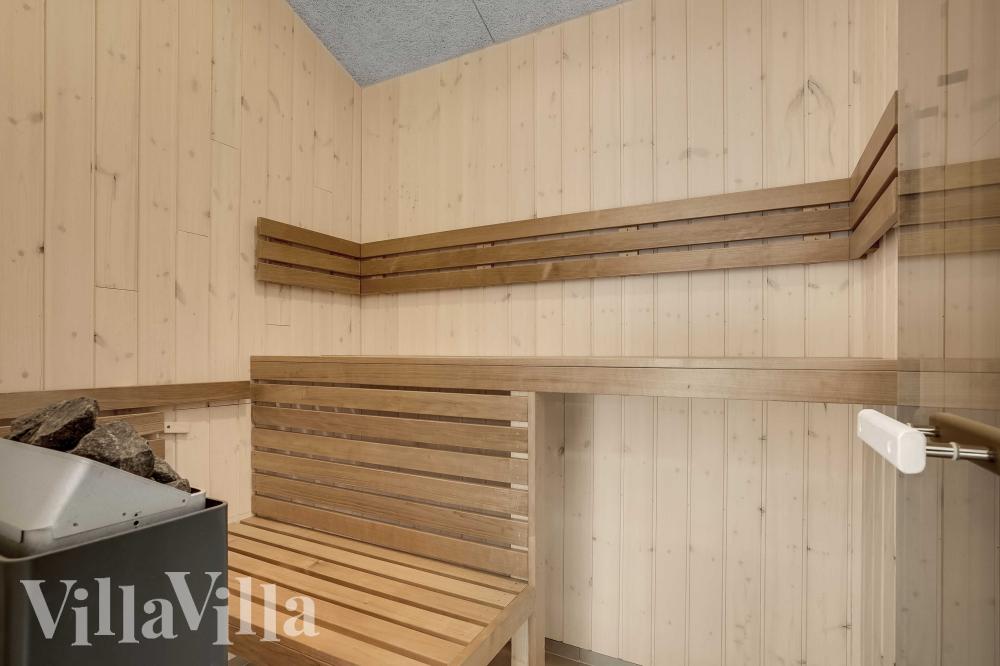 Genießen Sie die heiße Sauna im Luxusferienhaus Nr. 945 für 12 Personen