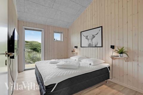 Eines der 6 Schlafzimmer im Luxusferienhaus Nr. 945