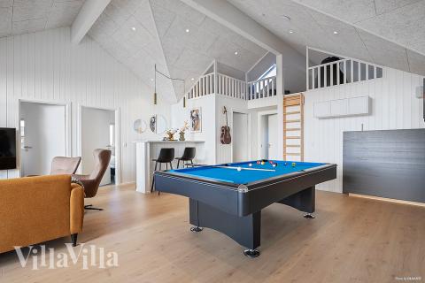 Neben den vielen schönen Stunden, die man im Poolbereich des Hauses verbringen kann, bietet das Luxusferienhaus 948 auch Spielevergnügen bei Billard/Tischtennis und Darts