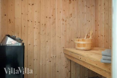 Genießen Sie die heiße Sauna im Luxusferienhaus Nr. 953 für 14 Personen